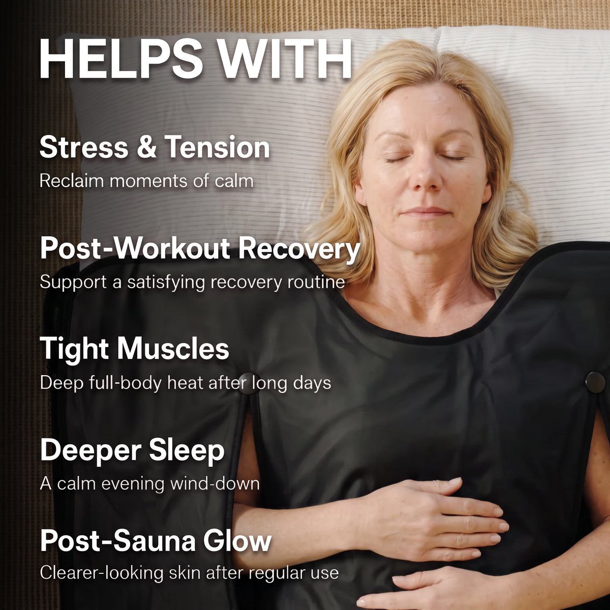 Woman using a black infrared sauna blanket for stress relief, workout recovery, tight muscles, sleep and skin glow